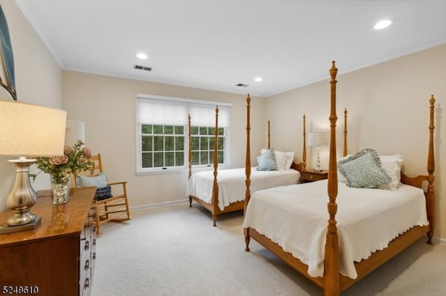 bedroom with crown molding, recessed lighting, visible vents, and light colored carpet