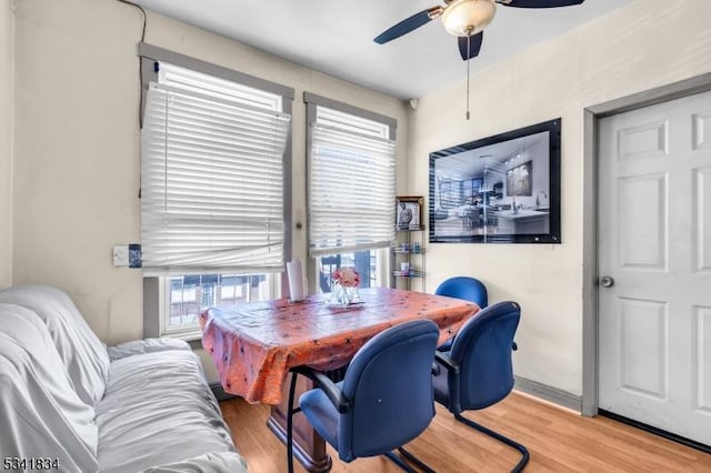 office with ceiling fan and wood finished floors