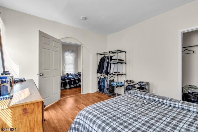 bedroom featuring wood finished floors