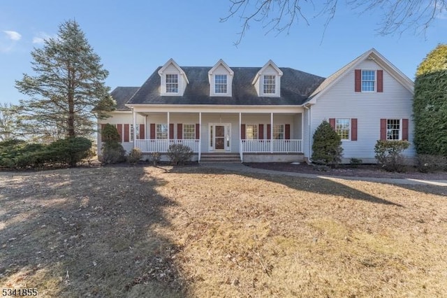 cape cod home with covered porch