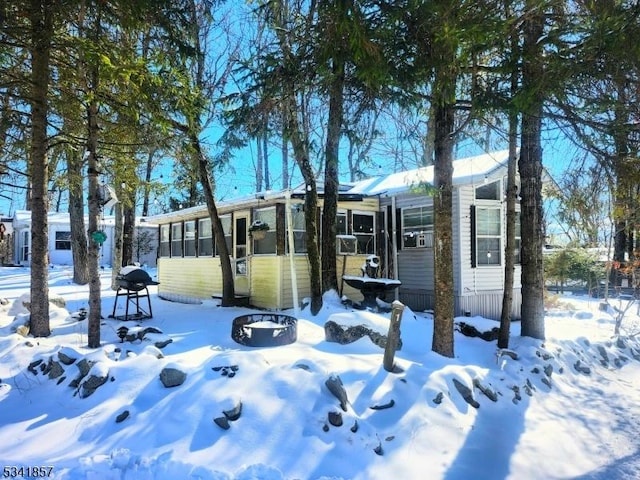 exterior space with a sunroom