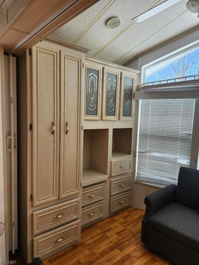 living area with wood finished floors