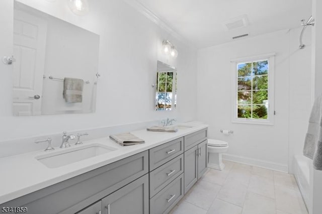 full bathroom featuring visible vents, plenty of natural light, a sink, and toilet