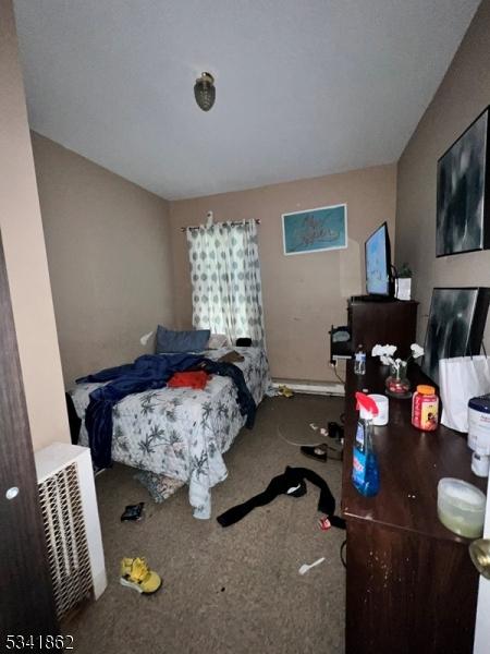 bedroom featuring carpet flooring