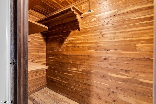 spacious closet featuring wood finished floors