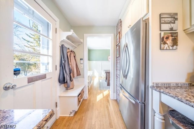 mudroom featuring light wood finished floors