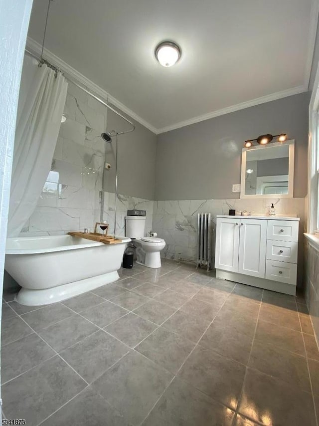 bathroom featuring crown molding, tile walls, radiator, shower / bathtub combination with curtain, and vanity