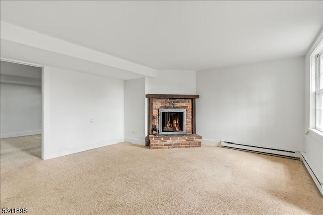 unfurnished living room with a baseboard heating unit, carpet floors, and a fireplace