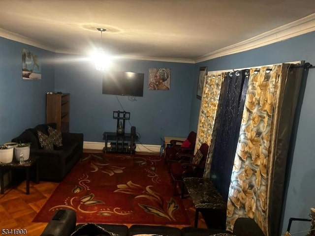 bedroom featuring ornamental molding and baseboards