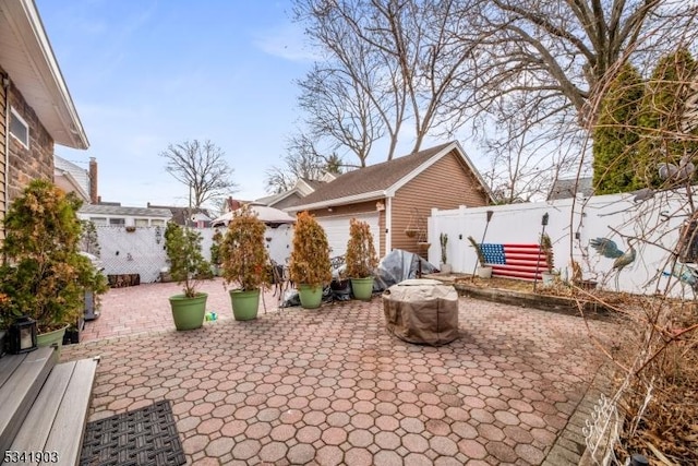 view of patio / terrace featuring an outdoor structure and fence