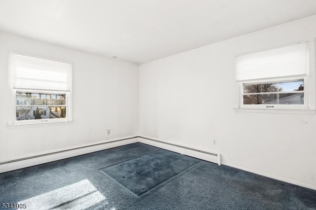 unfurnished room featuring plenty of natural light and carpet