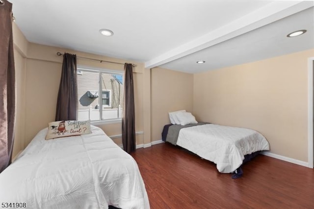 bedroom featuring beam ceiling, baseboards, wood finished floors, and recessed lighting