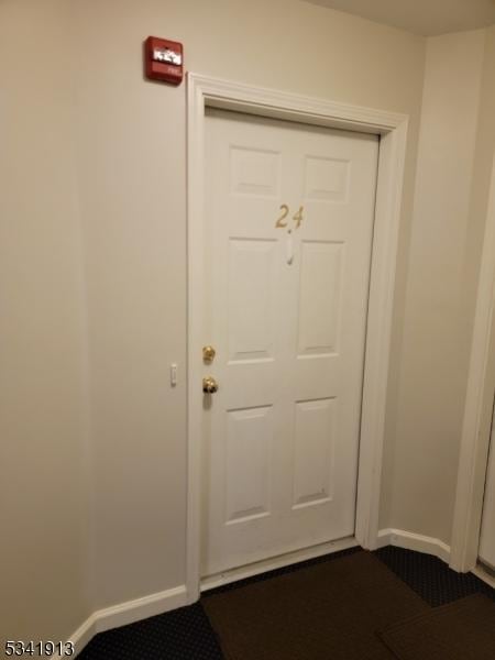 doorway with baseboards