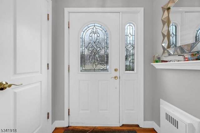 entryway featuring baseboards