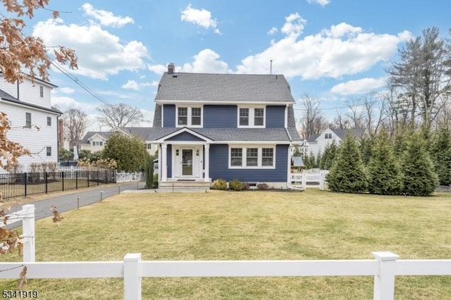 view of front of property featuring roof with shingles, a front yard, and fence