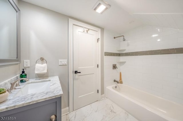 full bath with marble finish floor, bathtub / shower combination, visible vents, and vanity