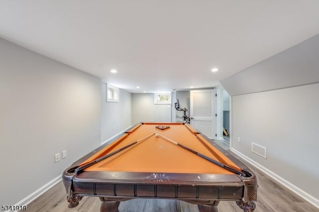 game room featuring baseboards, visible vents, wood finished floors, and pool table