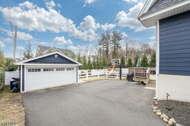 detached garage with fence