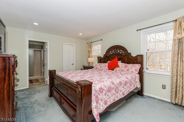 bedroom featuring light carpet, multiple windows, baseboards, and recessed lighting