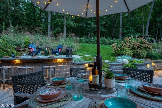 view of patio / terrace featuring outdoor dining area and outdoor dry bar