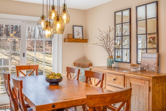 dining area featuring plenty of natural light