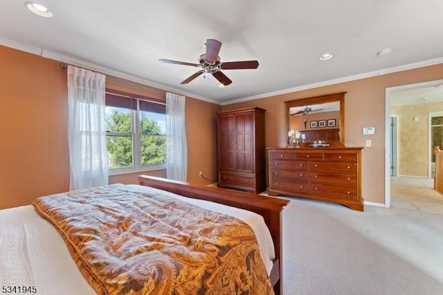 bedroom featuring recessed lighting, baseboards, light carpet, and ornamental molding