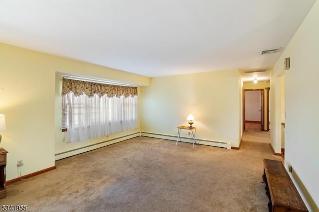 unfurnished living room featuring visible vents, a baseboard heating unit, baseboards, carpet, and a baseboard radiator