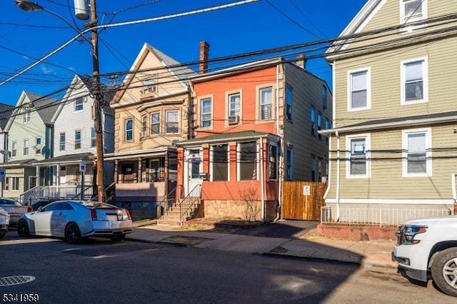 view of front facade featuring entry steps and a residential view