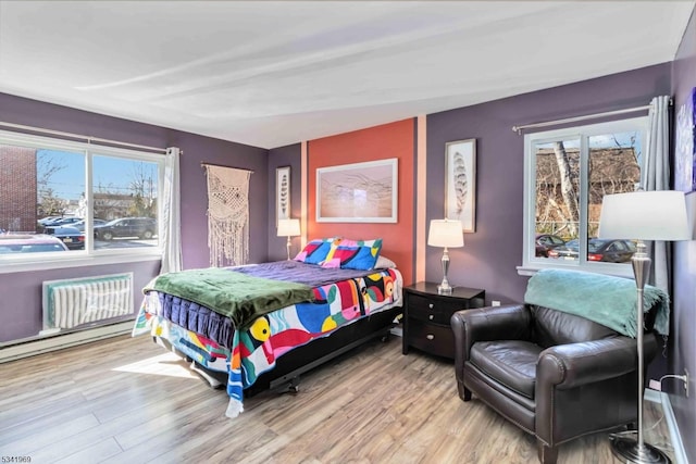 bedroom featuring wood finished floors