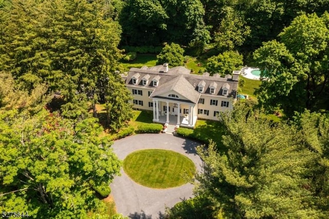 drone / aerial view with a forest view