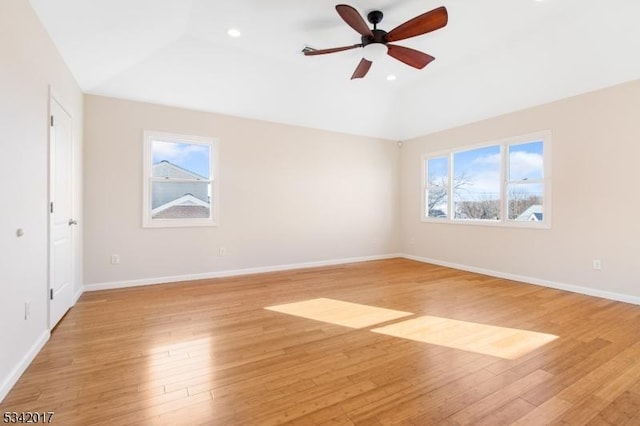 unfurnished bedroom featuring recessed lighting, light wood-type flooring, a ceiling fan, and baseboards