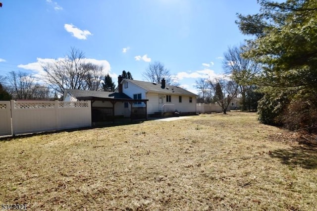 view of yard featuring fence