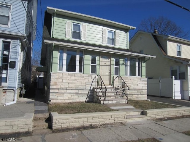 view of front facade featuring stone siding