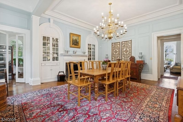29 Kitchell Rd, Morris Twp, NJ 07960 - dining room with crown molding, a decorative wall, a chandelier, and wood finished floors