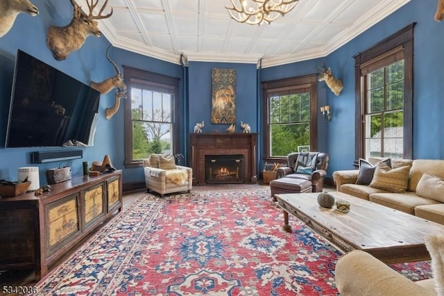 29 Kitchell Rd, Morris Twp, NJ 07960 - living area with healthy amount of natural light, a chandelier, and a brick fireplace
