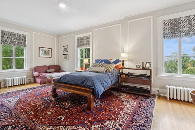 29 Kitchell Rd, Morris Twp, NJ 07960 - bedroom with radiator heating unit and hardwood / wood-style flooring