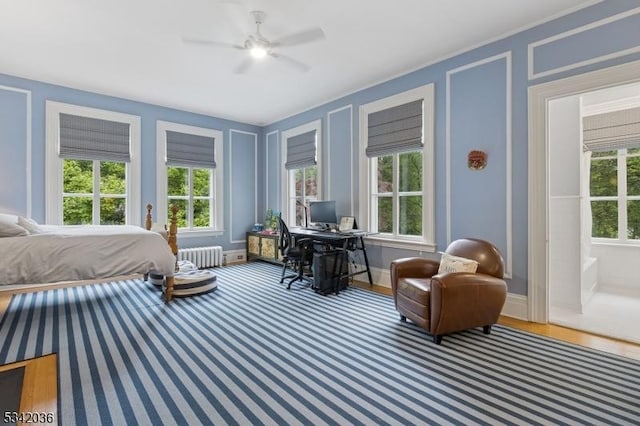 29 Kitchell Rd, Morris Twp, NJ 07960 - bedroom with radiator heating unit, wood finished floors, and ceiling fan