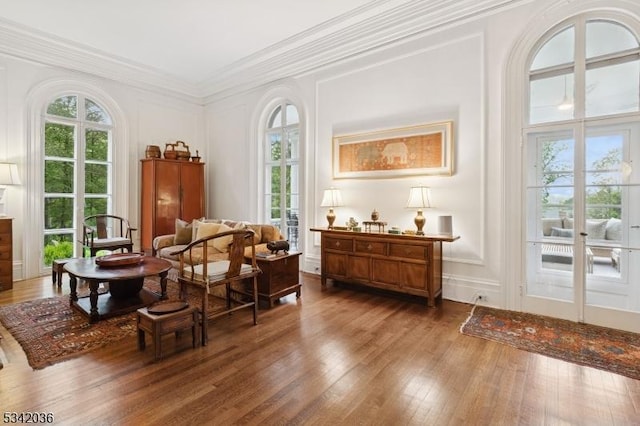 29 Kitchell Rd, Morris Twp, NJ 07960 - living area with wood finished floors, ornamental molding, a decorative wall, and french doors