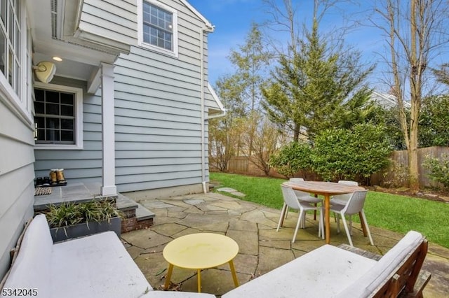 view of patio / terrace with outdoor dining area and a fenced backyard