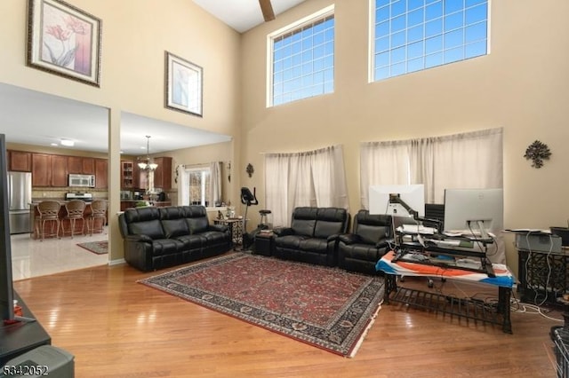 living area with a wealth of natural light and wood finished floors