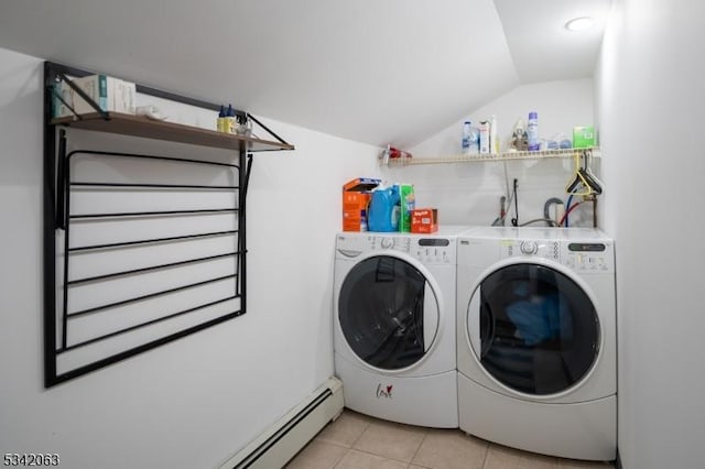 clothes washing area with light tile patterned floors, laundry area, and independent washer and dryer