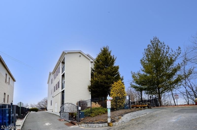 view of street featuring a gate