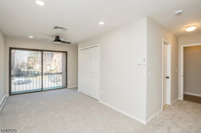 interior space featuring a ceiling fan, recessed lighting, baseboards, and visible vents