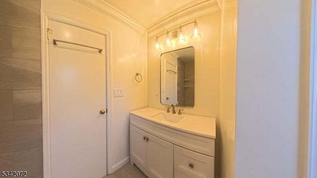 bathroom featuring vanity and crown molding