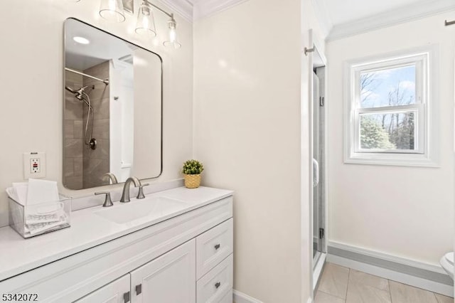 full bathroom featuring baseboards, walk in shower, ornamental molding, and vanity