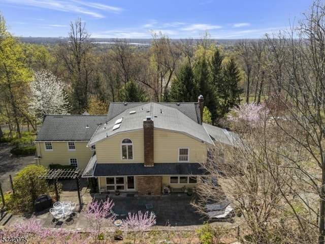 bird's eye view with a forest view