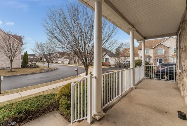 balcony featuring a residential view