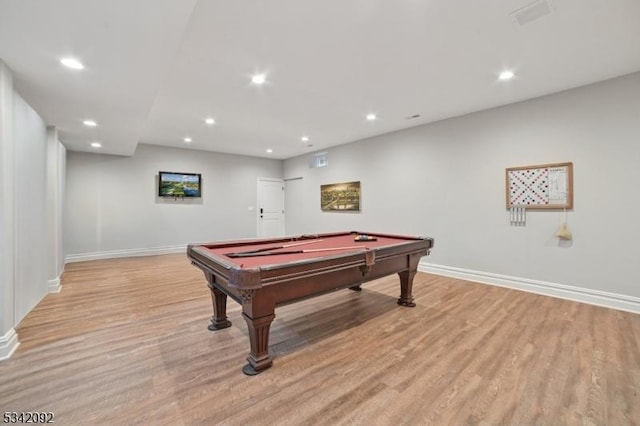 game room with baseboards, light wood-style flooring, and recessed lighting