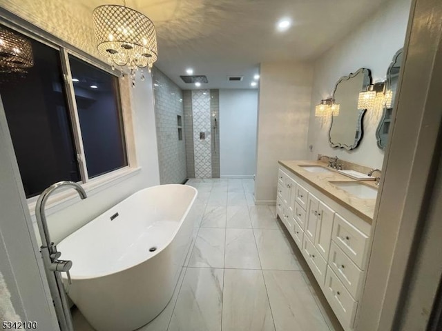 full bathroom with a soaking tub, double vanity, a sink, and a walk in shower