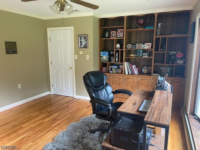 office area featuring ceiling fan, baseboard heating, crown molding, and wood finished floors